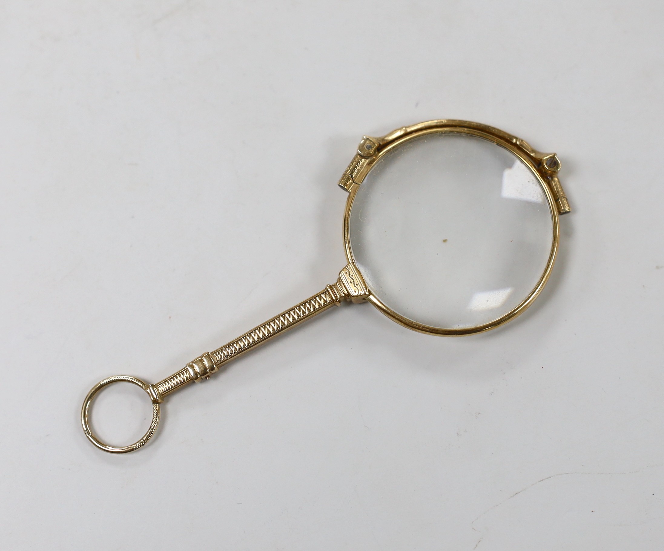 A pair of 9ct mounted lorgnettes, 10.2cm.